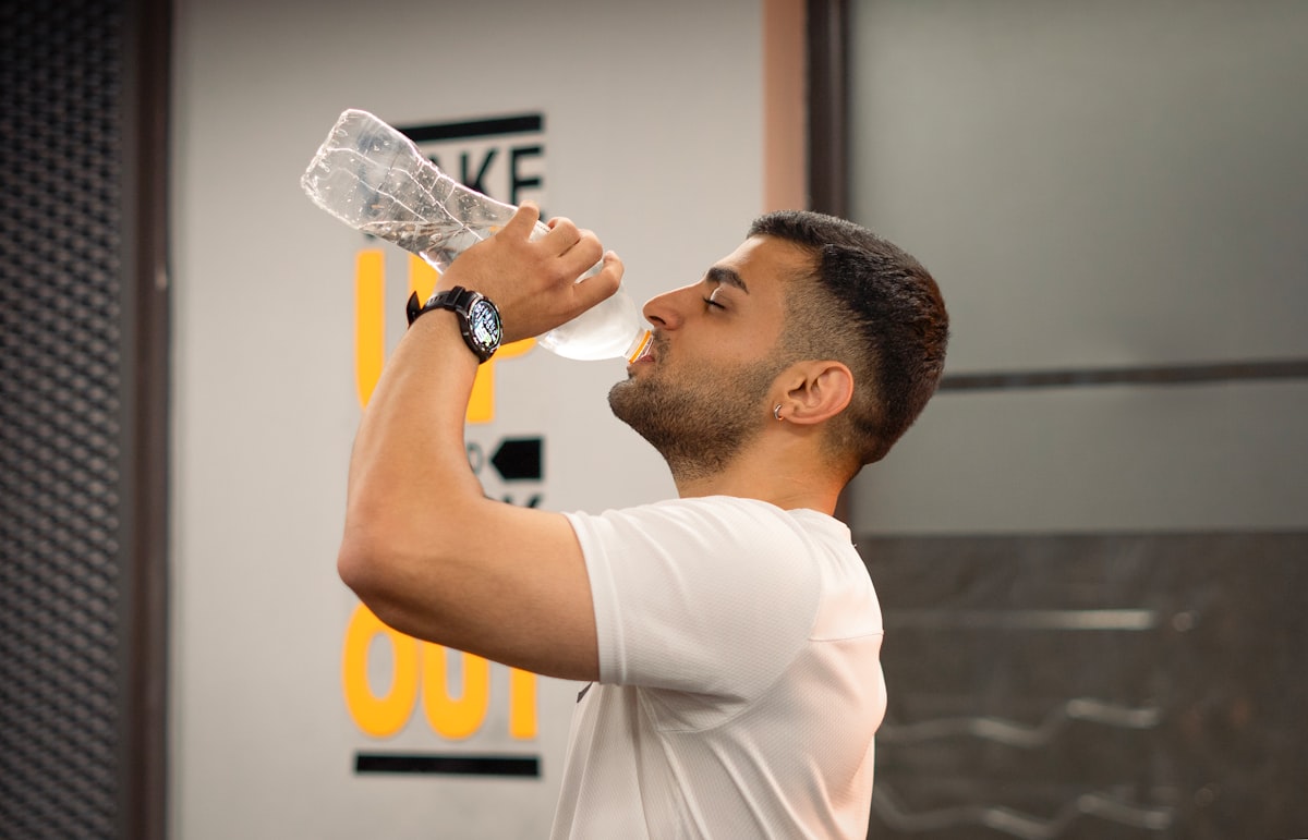 Active person hydrating during workout